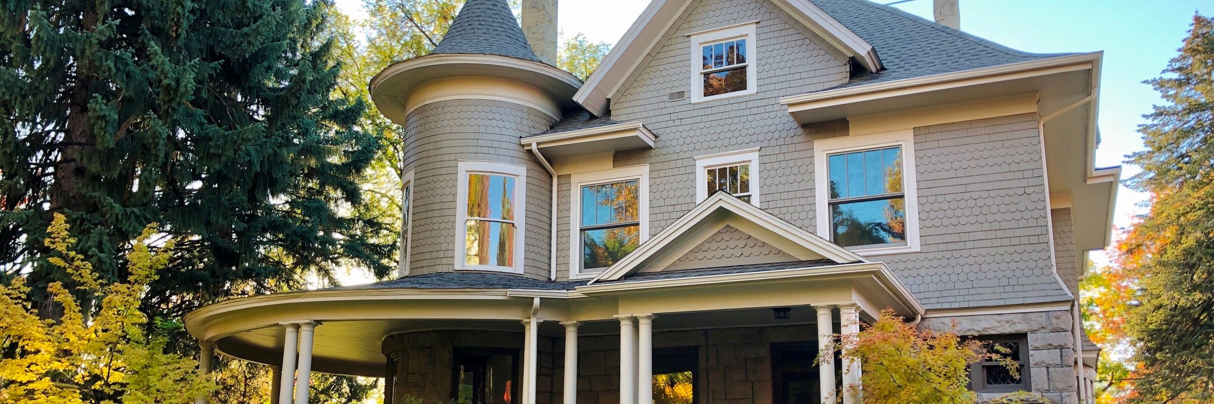 A single-family home with a front yard and a covered porch